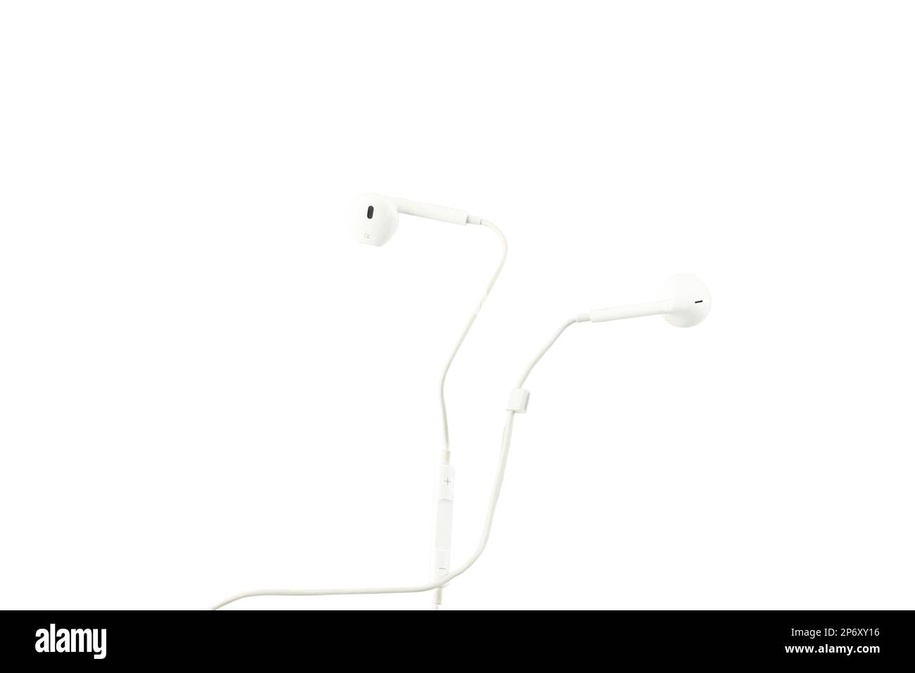 Closeup view of a white earphones on isolated white background Stock Photo