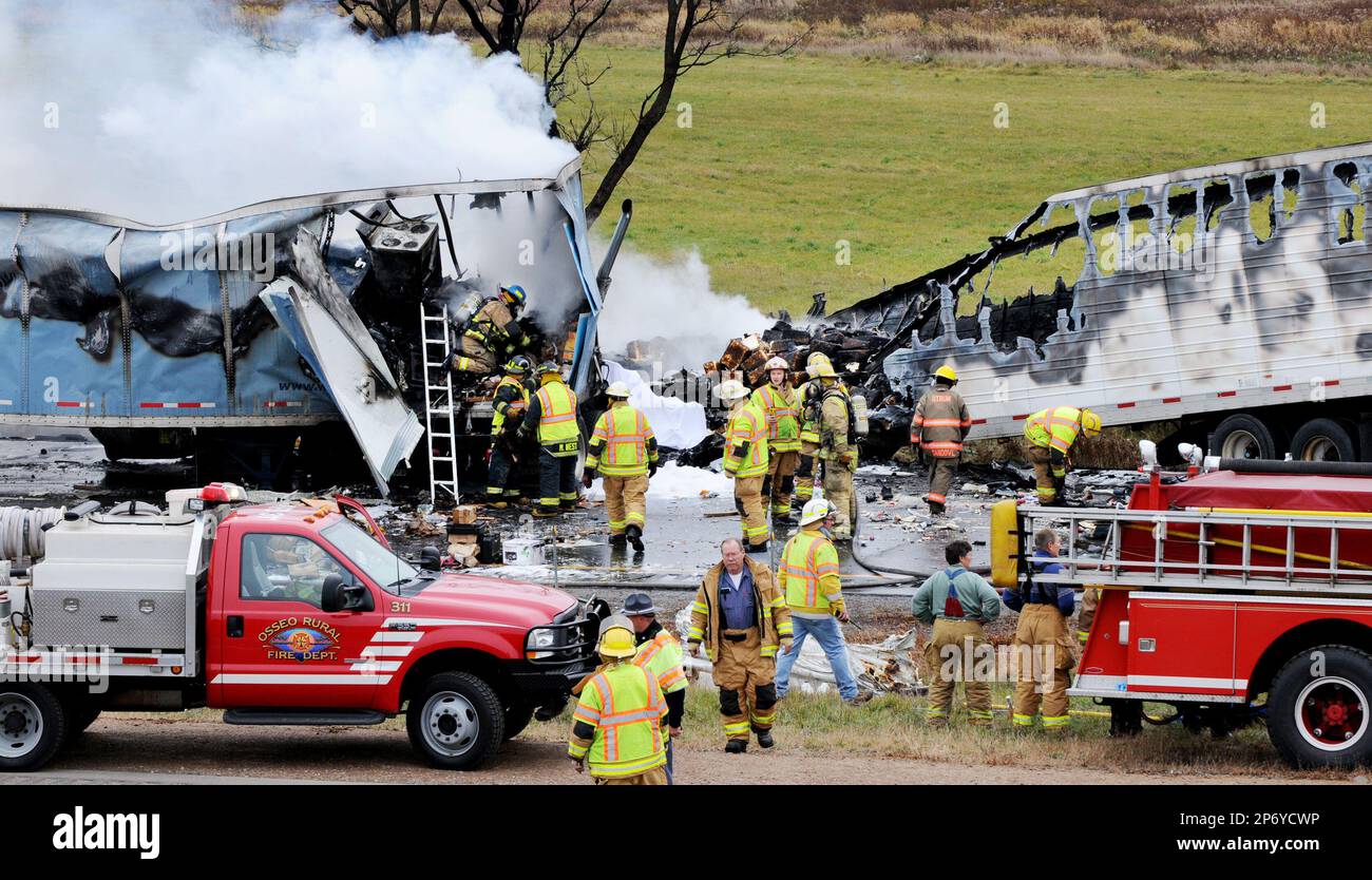 Emergency personnel work the scene of a crash involving three