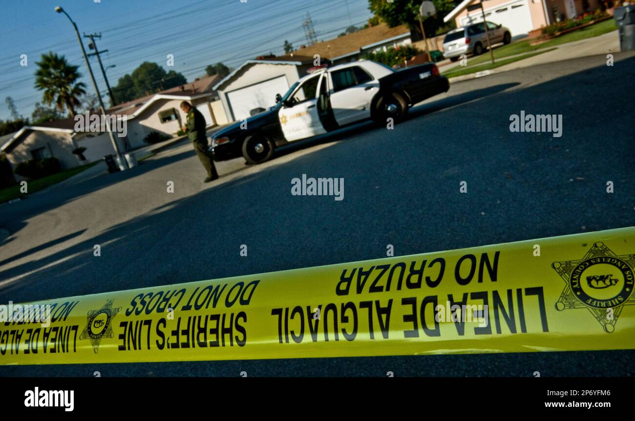 A Los Angeles County Sheriffs Department deputy mans the perimeter in ...