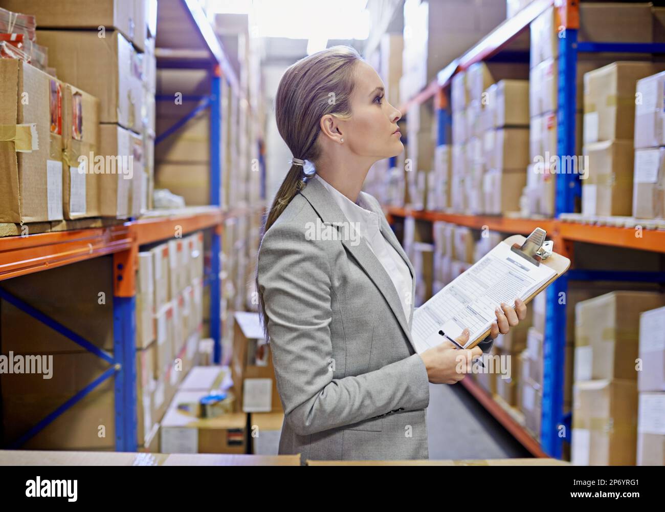 The ins and outs of shipping and receiving. a woman at work in a