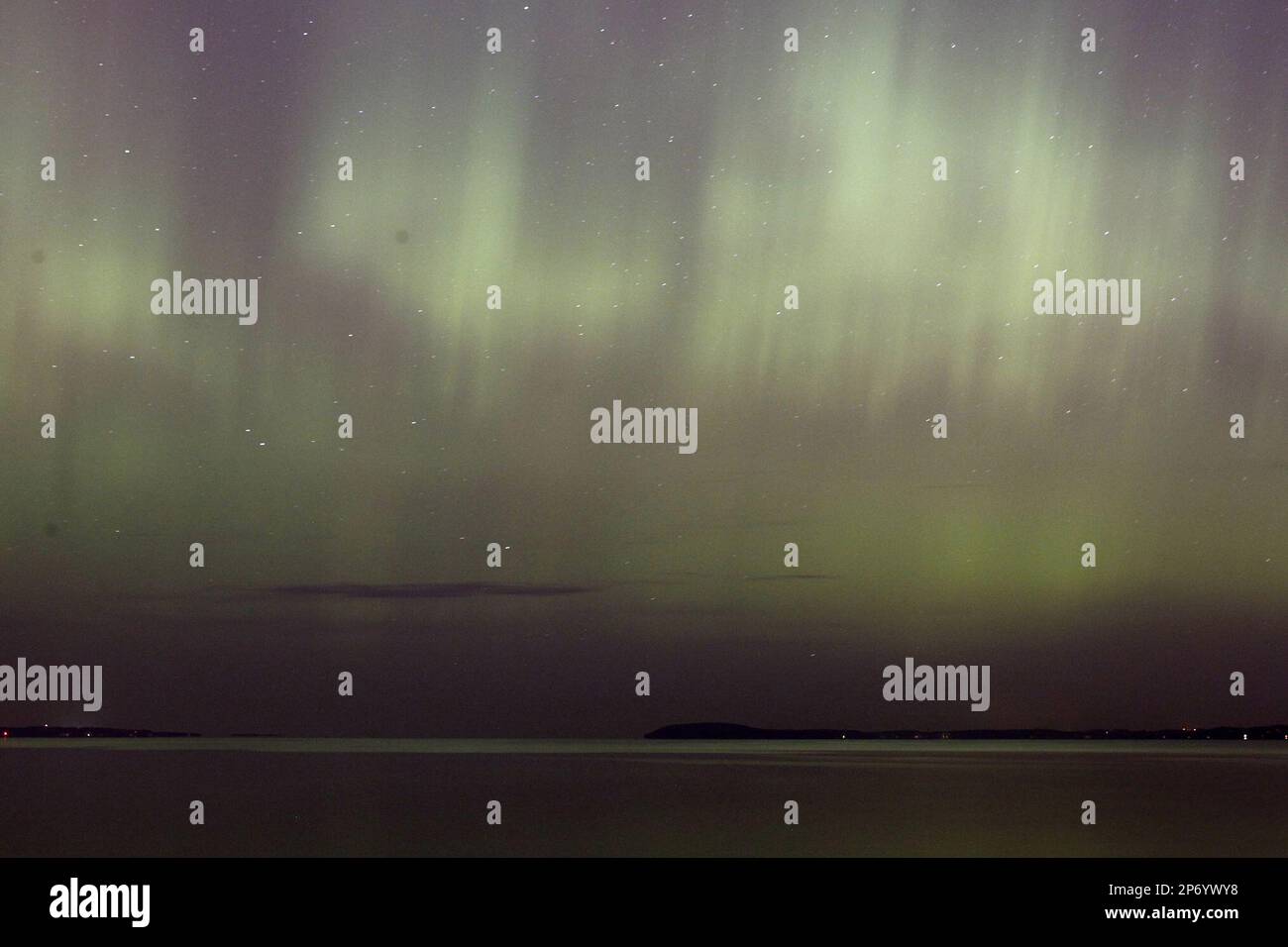 the-northern-lights-shine-over-west-grand-traverse-bay-near-traverse