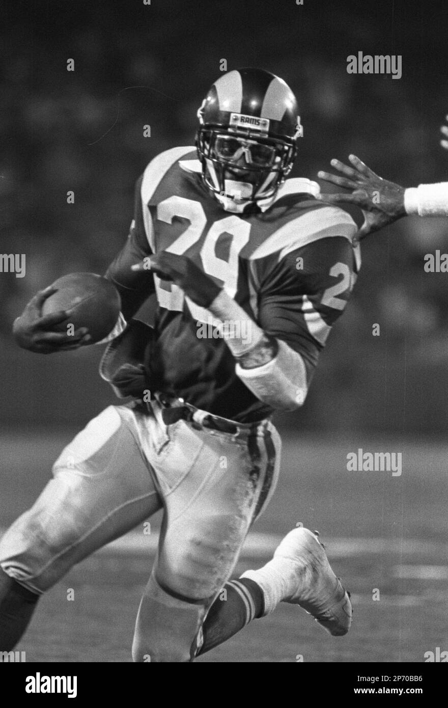 Los Angeles Rams Eric Dickerson with the ball and making a play during