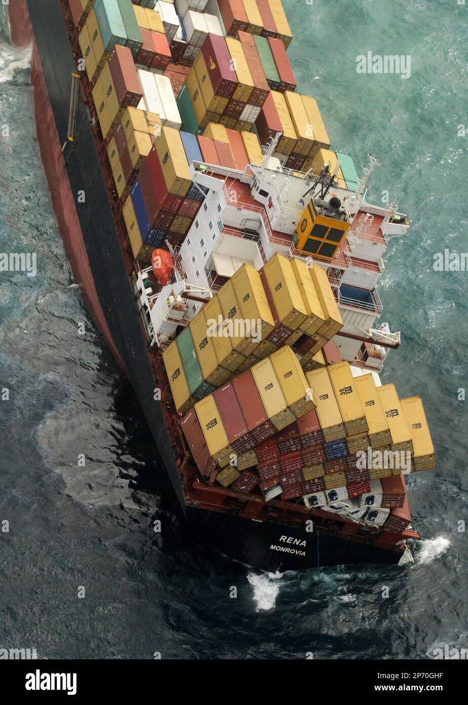 The cargo ship Rena is battered by waves Wednesday, Oct. 12, 2011 ...