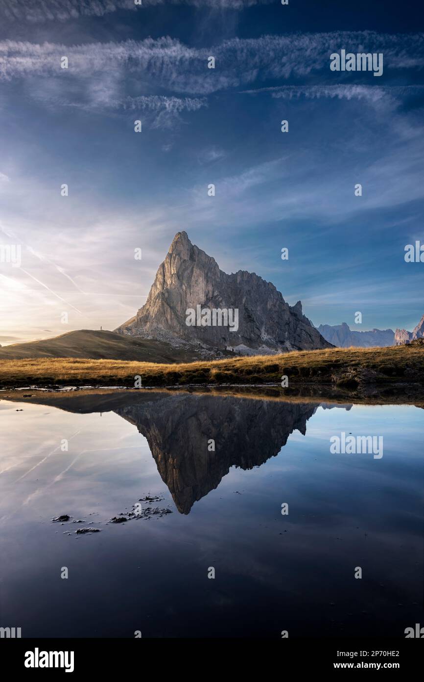 Picture of Mount Ra Gusela reflecting in a pond in Passo Giau, Cortina d'Ampezzo, Italy Stock Photo