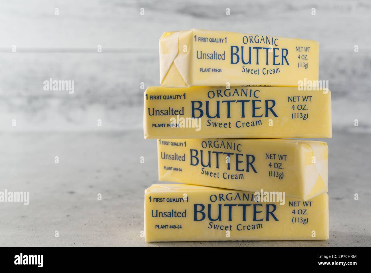 Butter sticks closeup. Wrapped organic unsalted butter sticks on a