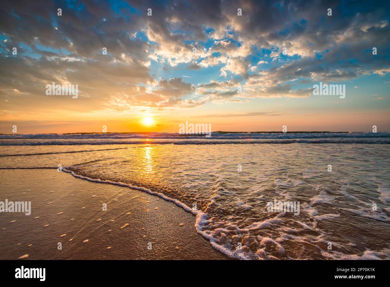 Beach sunrise over the tropical sea Stock Photo - Alamy