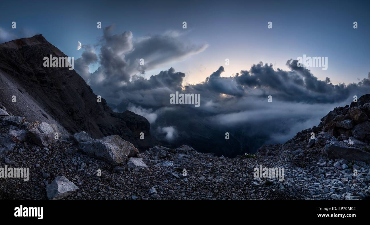 Picture of cloud formations after sunset in the Tofane range, famous mountains in Cortina d'Ampezzo, Italy Stock Photo
