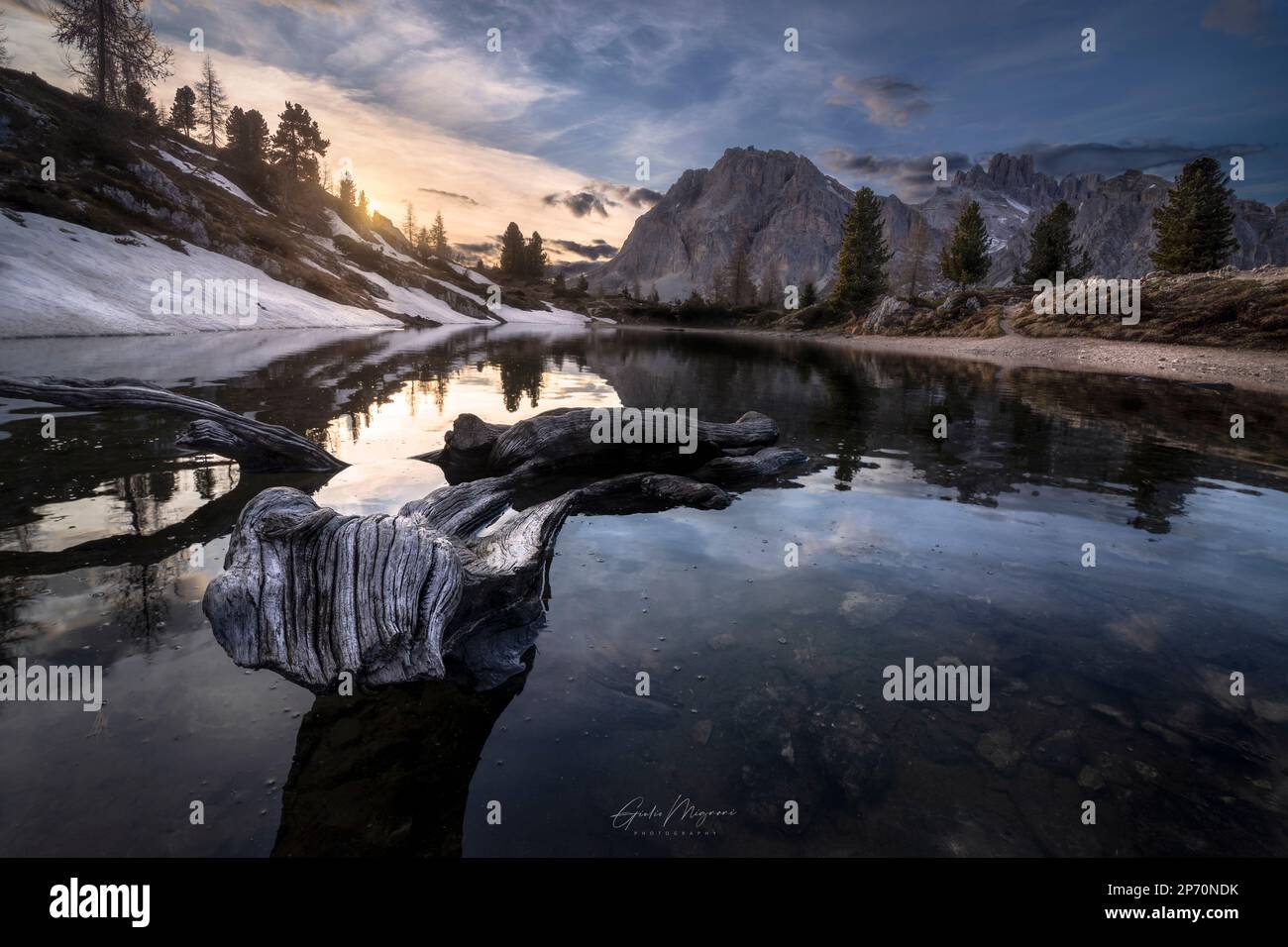 Picture of Mount Lagazuoi reflections in Lake Limides at sunset, Cortina d'Ampezzo, Italy Stock Photo