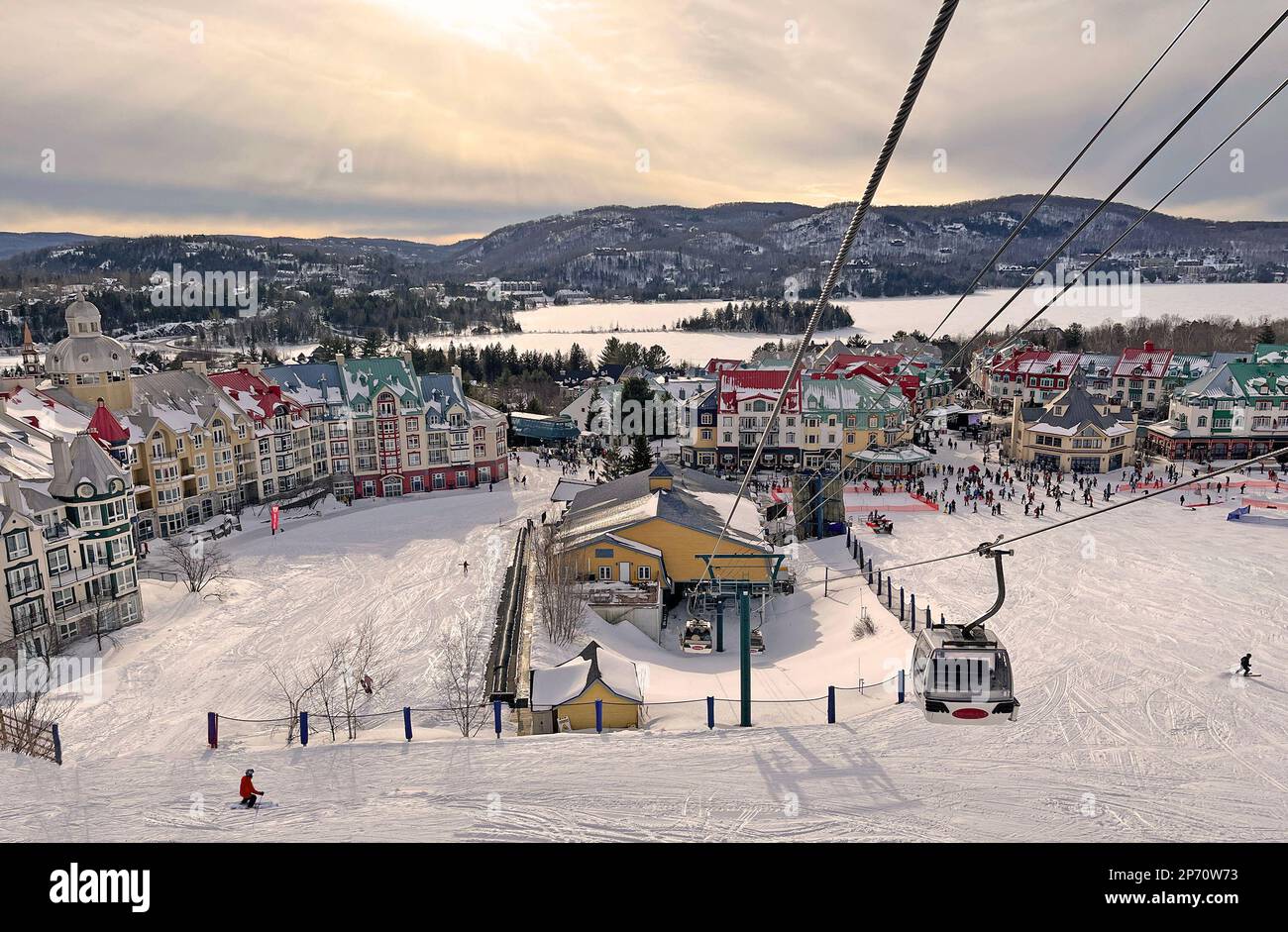Mont Tremblant village and lake in winter with funiculars in foreground, Quebec, Canada Stock