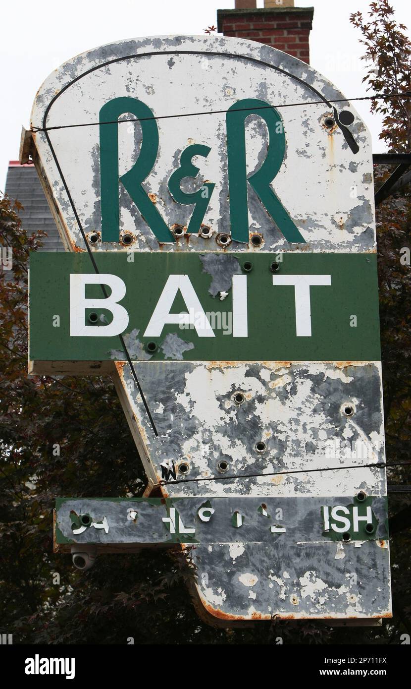 In this Sept. 19, 2011, photo, the R&R Sports sign is seen in Columbus,  Ohio. Downtown Columbus holds a rarity among major metropolitan areas: a  small, family-owned bait shop in the middle