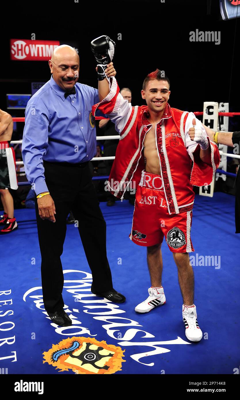 Roy Tapia (red) defeated Edgar Flores during the ShoBox boxing event at the Chumash Casino Resort in Santa Ynez, CA