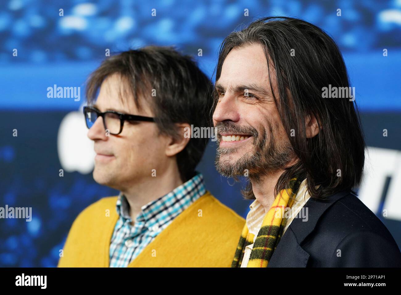 Rivers Cuomo, left, and Brian Bell of the band Weezer arrive at the