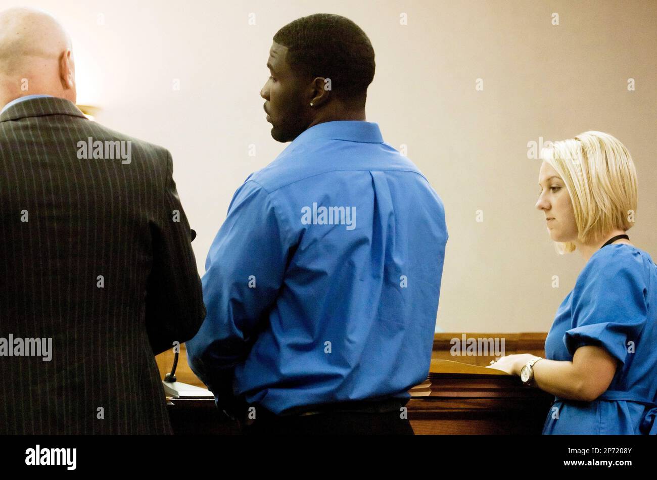 From left, Attorney Chris Slusher, former University of Missouri