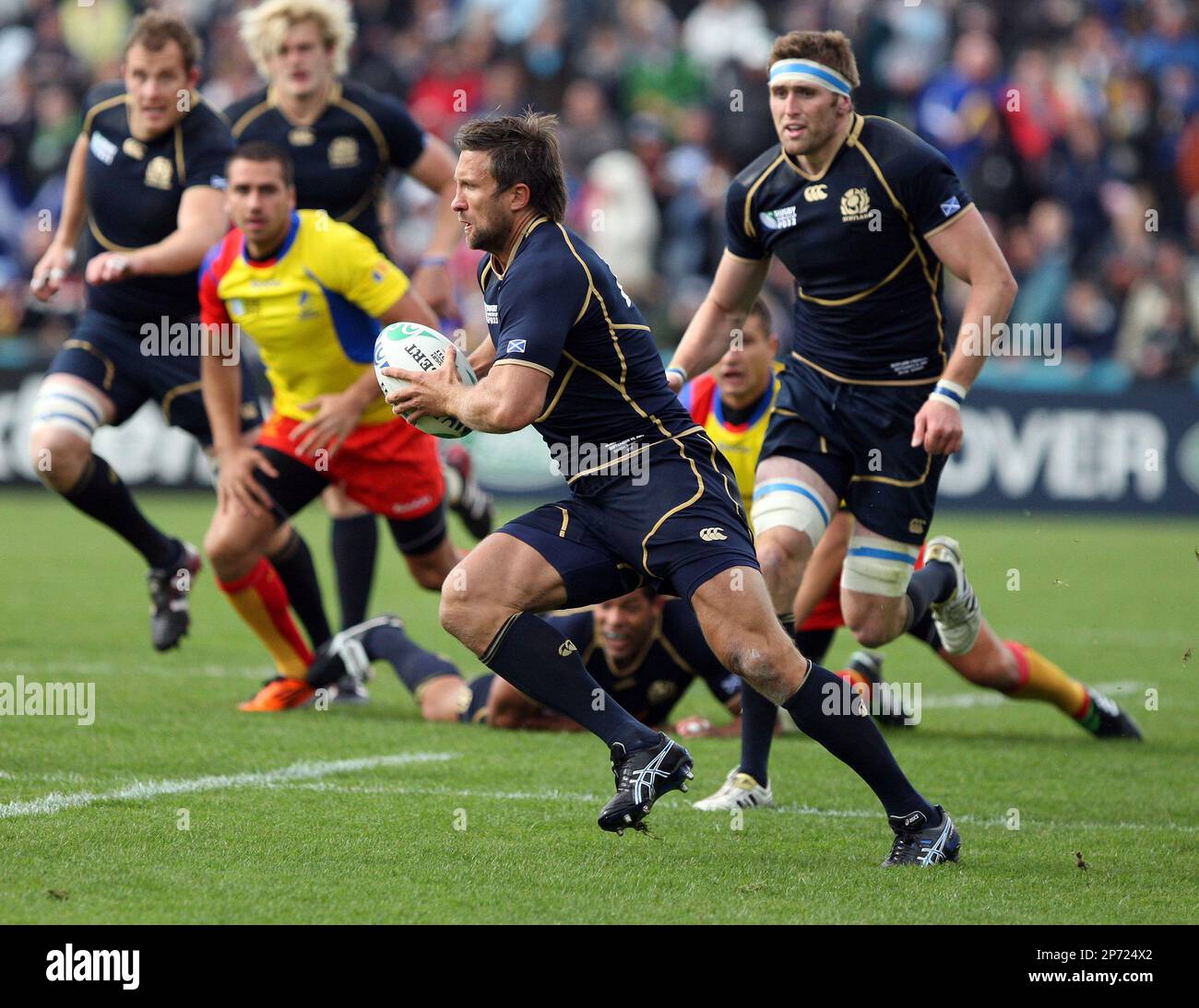 Scotland's Simon Danielli makes a break against Romania during their