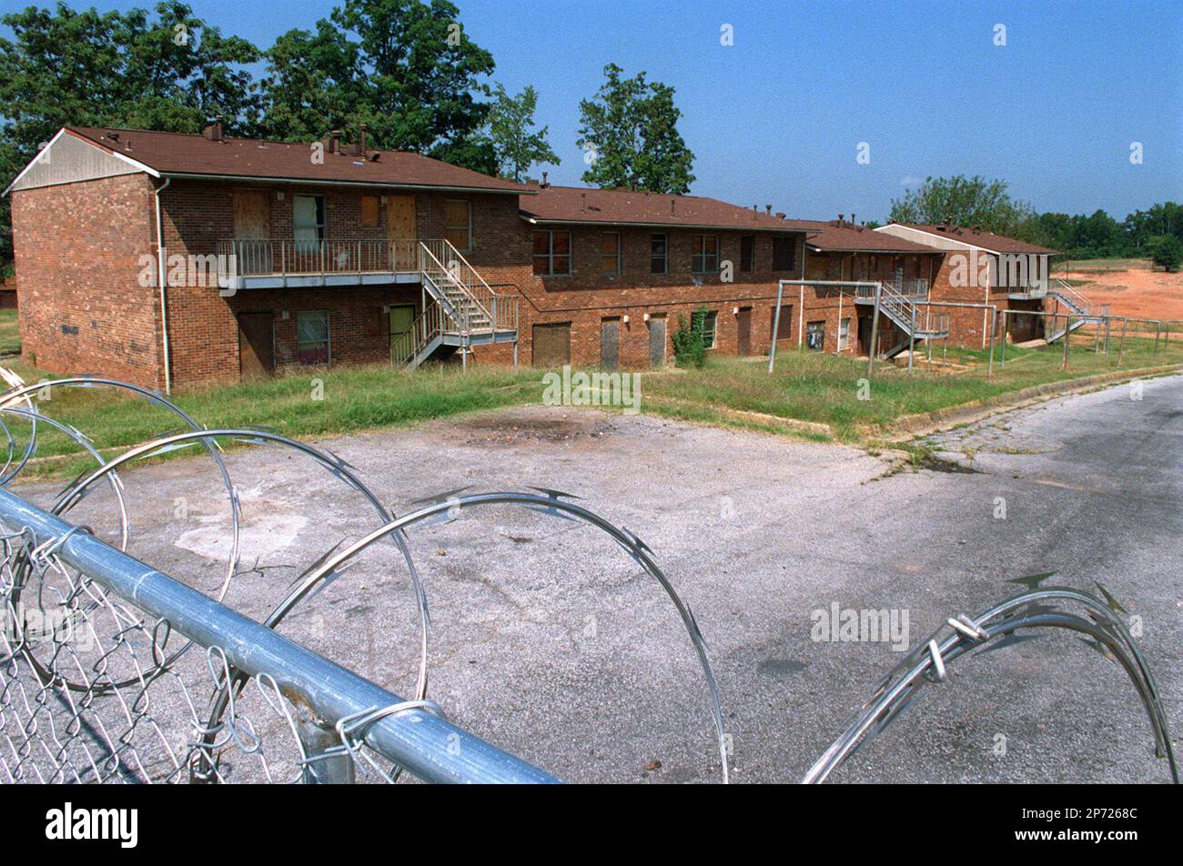 The old buildings of the East Lake Meadows Public Housing are boarded