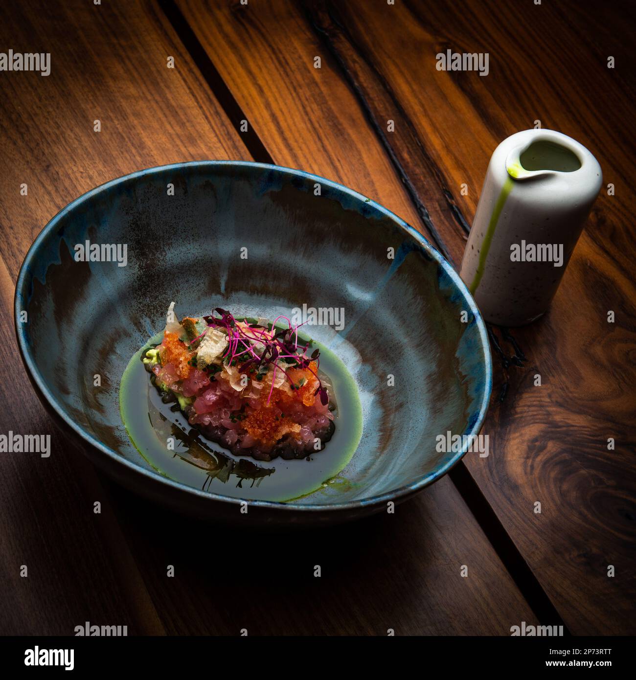 Appetizing seafood served in old fashioned dishes. Stock Photo