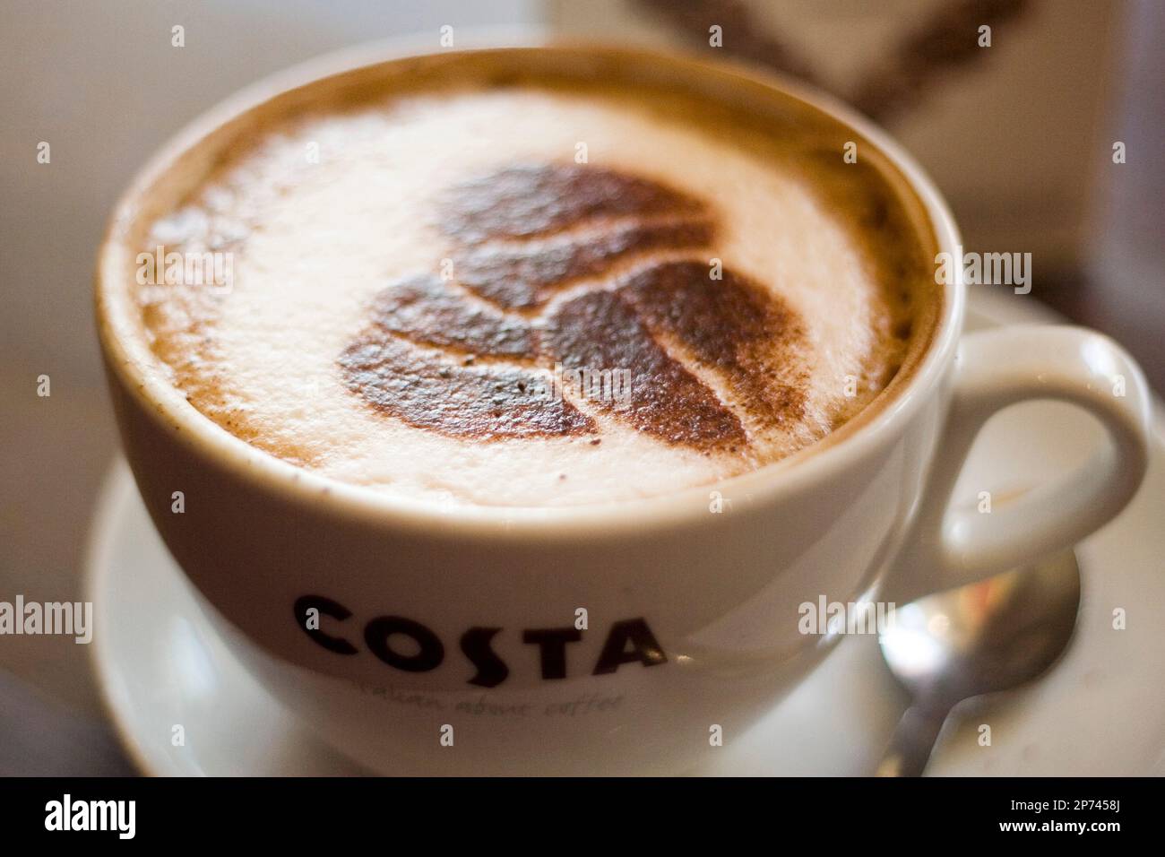 Illustrative Image Of A Costa Coffee Cappuccino And The Three Bean Logo illustrative-image-of-a-costa-coffee-cappuccino-and-the-three-bean-logo