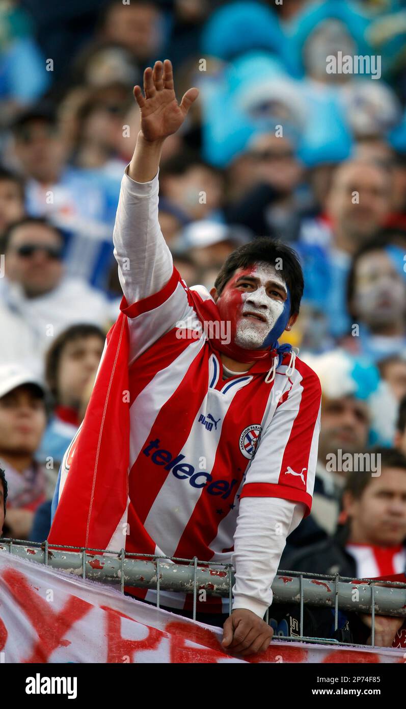 A Paraguay soccer fan cheers before the Copa America final match