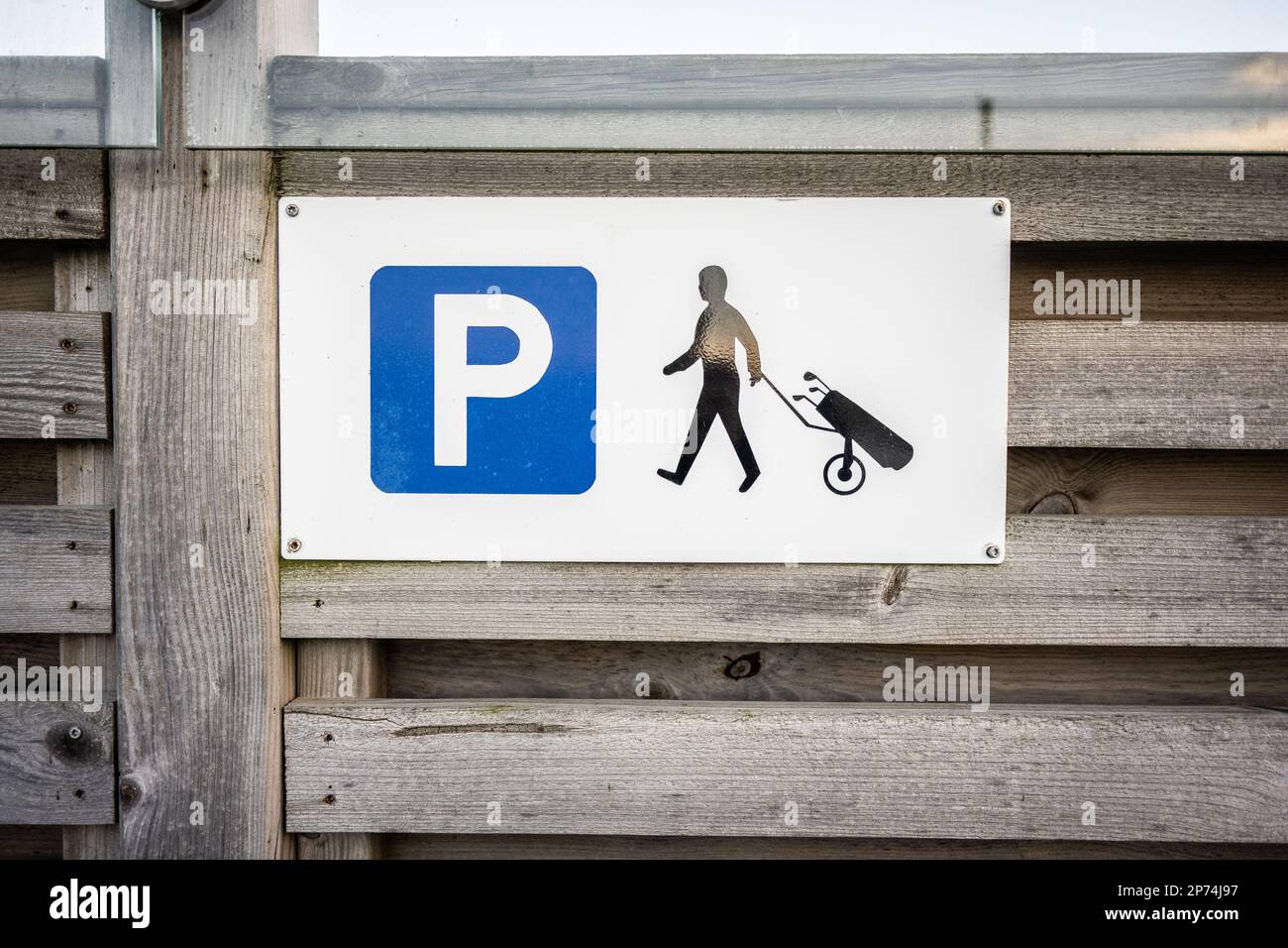 Sign marking golf caddy parking Stock Photo Alamy