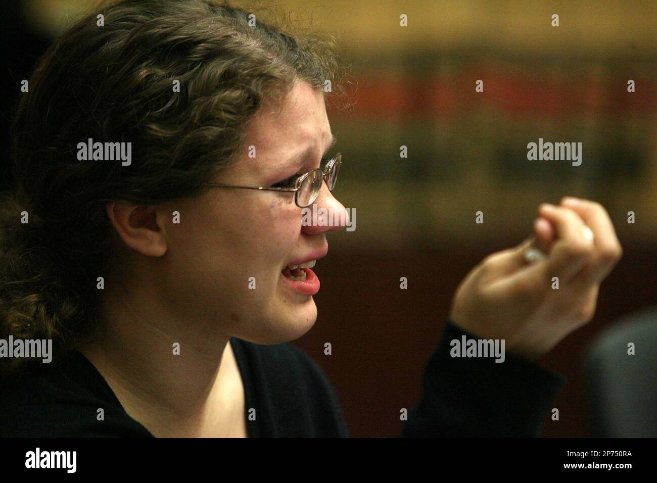 Jullian Bowman, daughter of victim Vicki BowmanHall, looks for a response from Michael Swanson