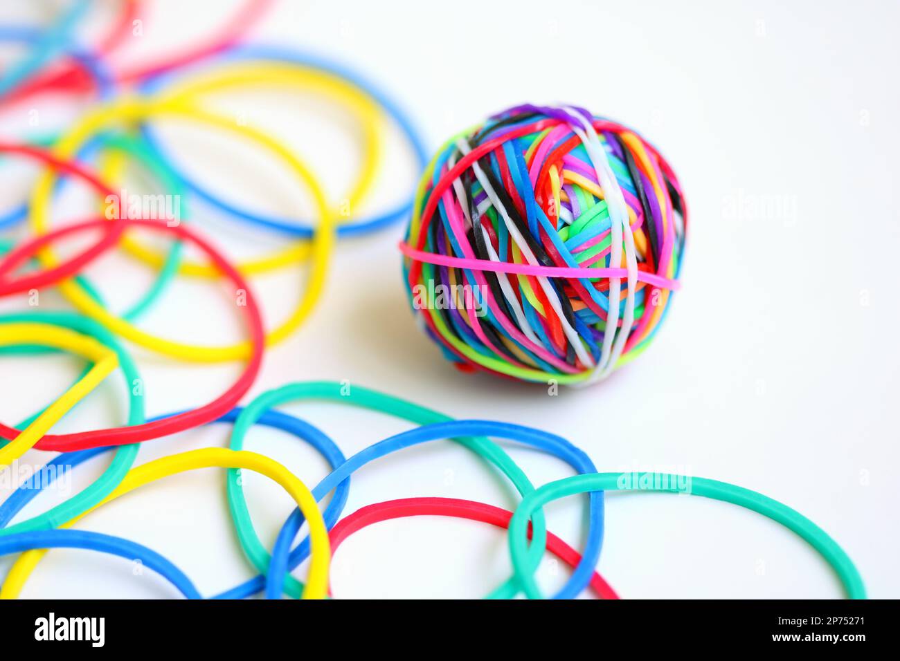 Colorful rubber band ball on white background Stock Photo