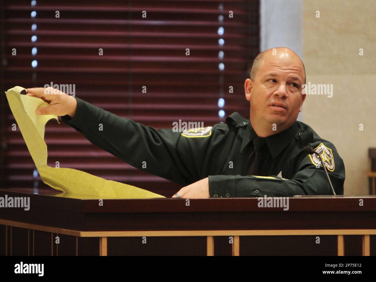 Jason a canine handler for the Orange County Sheriff's Department, testifies during the