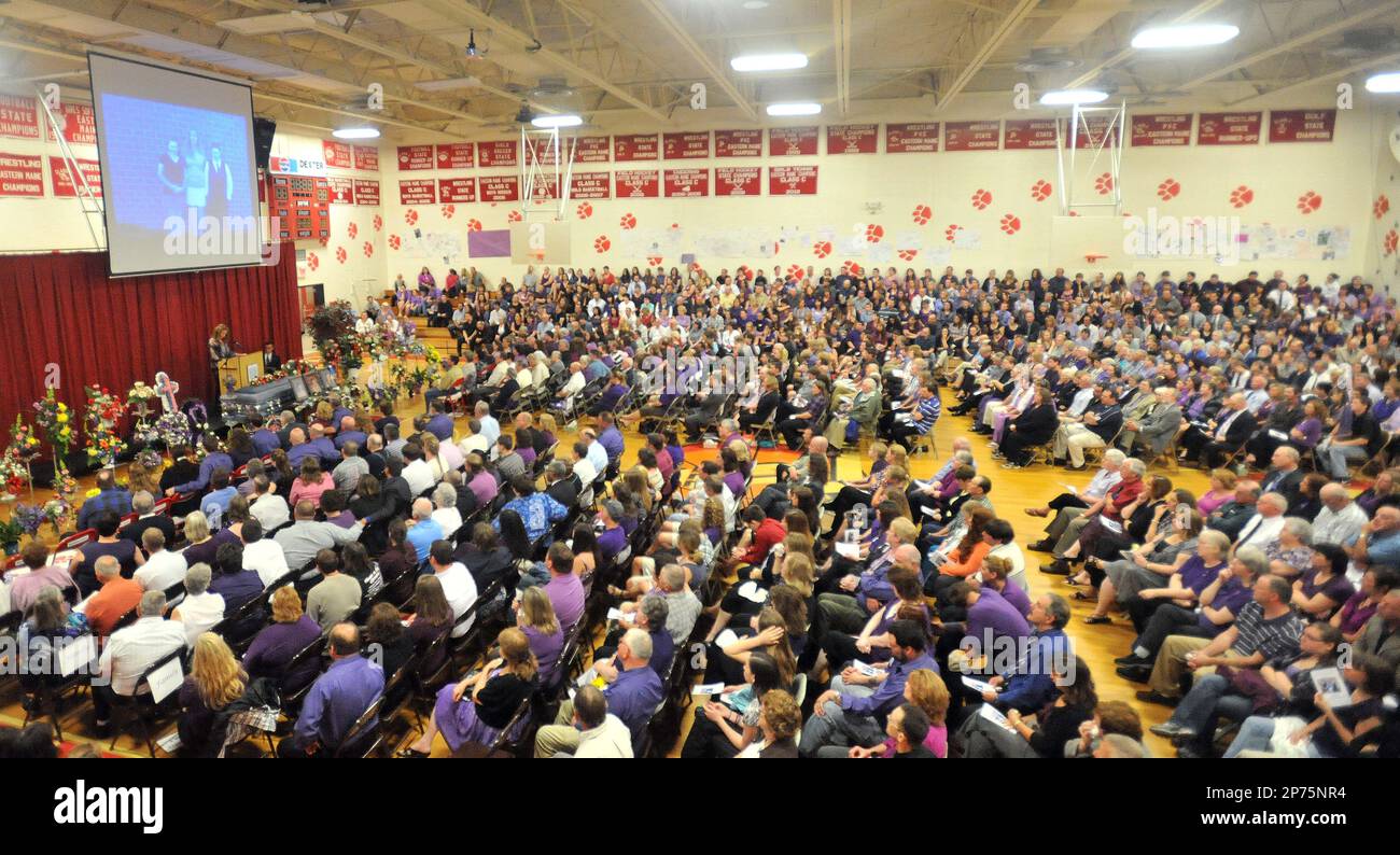 Family, friends and colleagues pack the gymnasium to remember Amy Lake