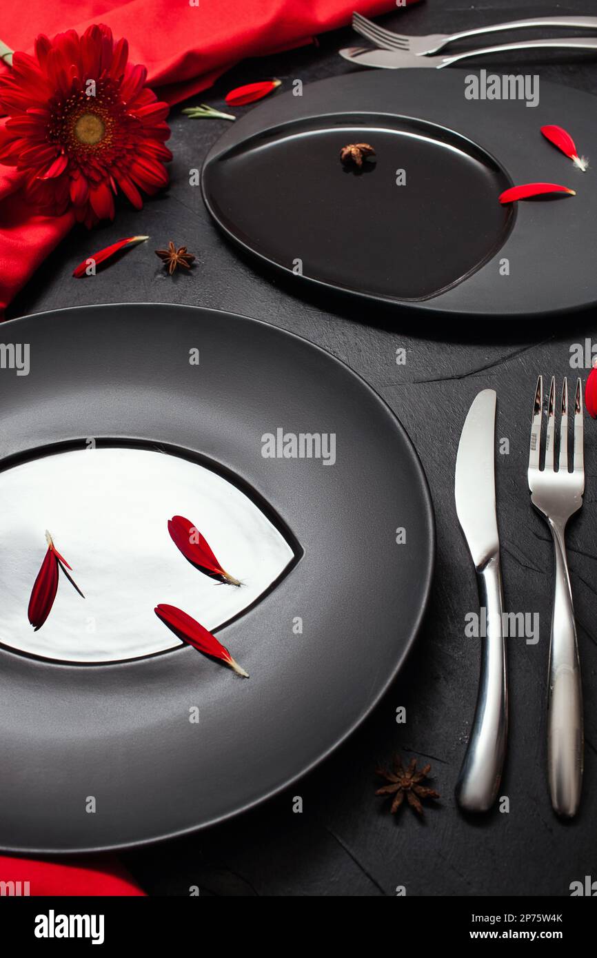 elegant crockery black background table setting Stock Photo Alamy