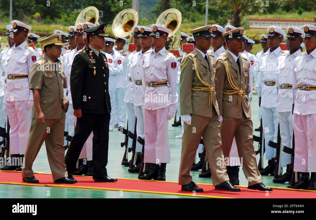 In this framegrab image from footage released by Myanmar Radio and  Television (MRTV) Wednesday, June 8, 2011, Myanmar's Gen. Min Aung Hlaing,  commander in chief of the Defense Services, left in front,