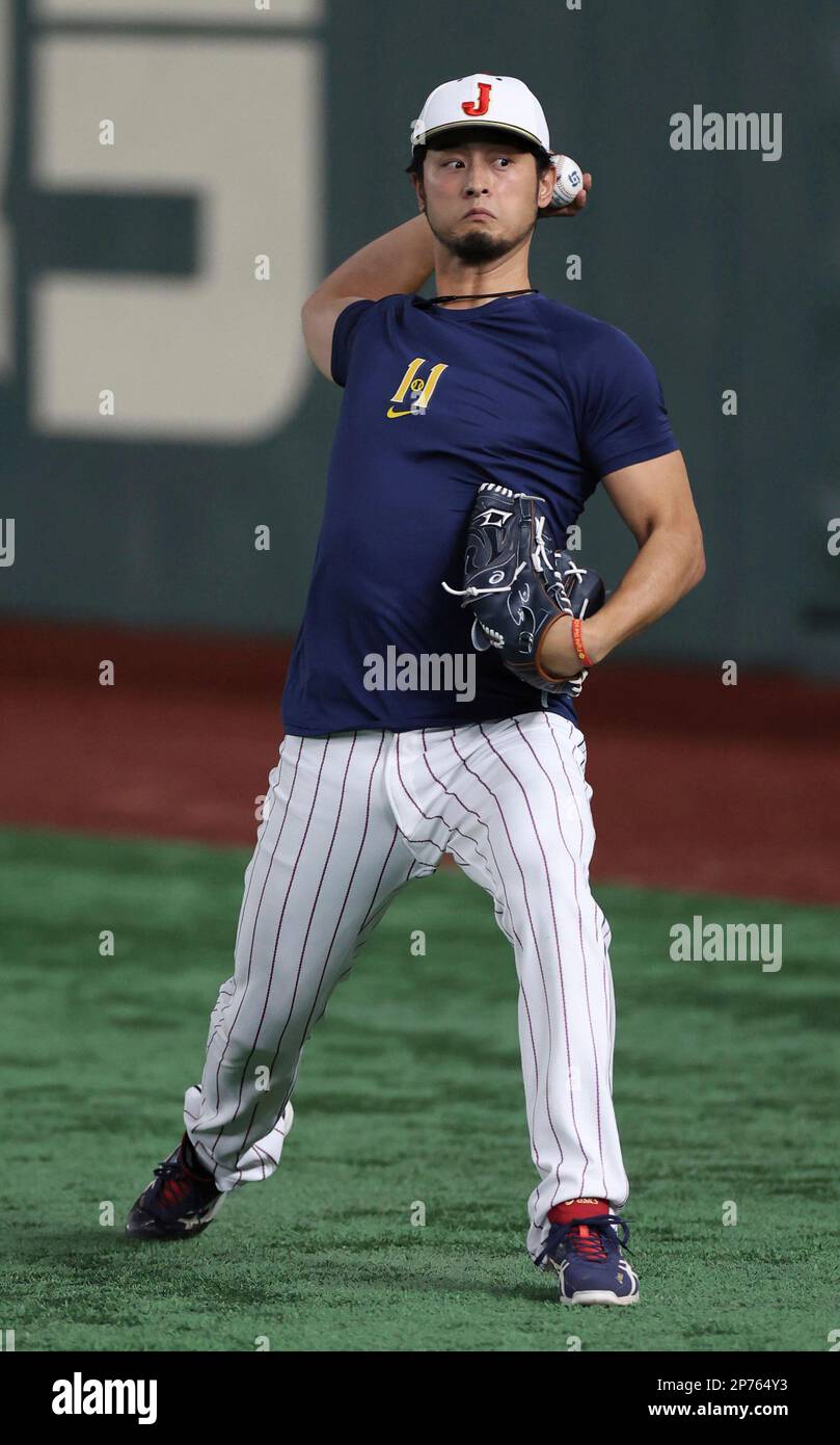 Japan's pitcher Yu DARVISH throws a ball during the practice session at ...