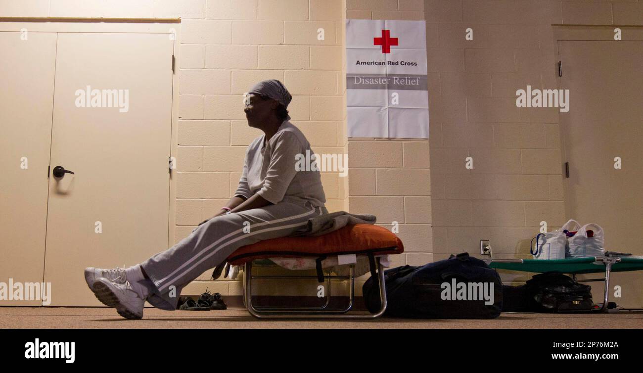 Flood victim Vivian Taylor-Wells sits on a cot at a Red Cross shelter in  Vicksburg, Miss., Wednesday, May 18, 2011. Forced from her home a week ago  by rising Mississippi river floodwaters,