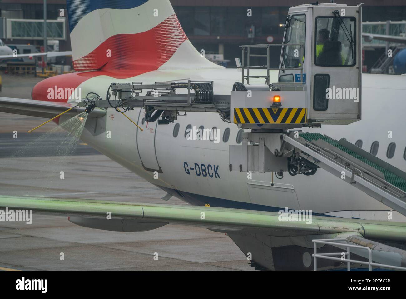 London, UK. 8 March 2023. The wings of a British Airways aircraft is