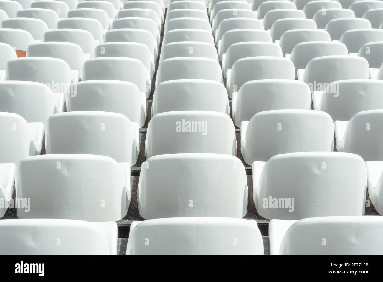 Tribune sports stadium with empty chairs Stock Photo - Alamy