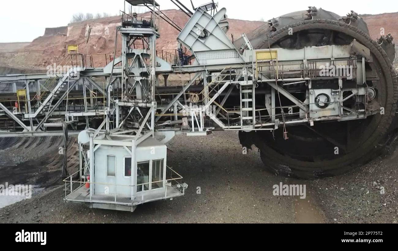Huge bucket wheel at a coal surface mine. Huge excavator on open pit