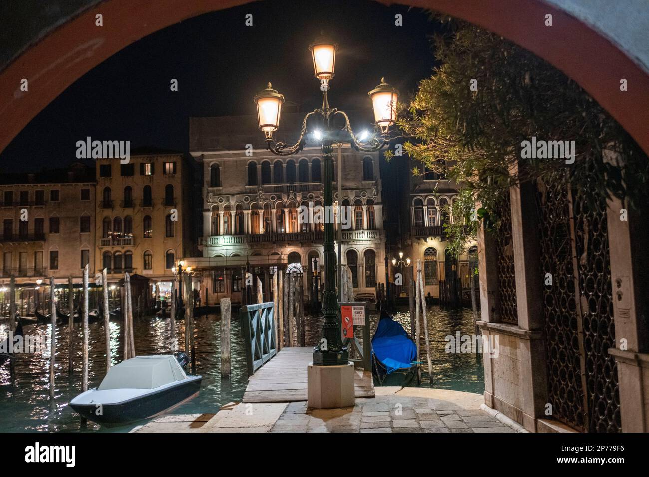 view through an archway of the Grand Canal at San Silvestro, San Polo district, Venice. Stock Photo