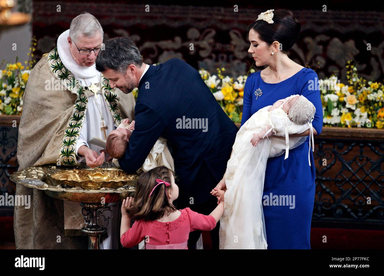 Crown Prince Frederik with his son at the christening with former Erik Normann Svendsen