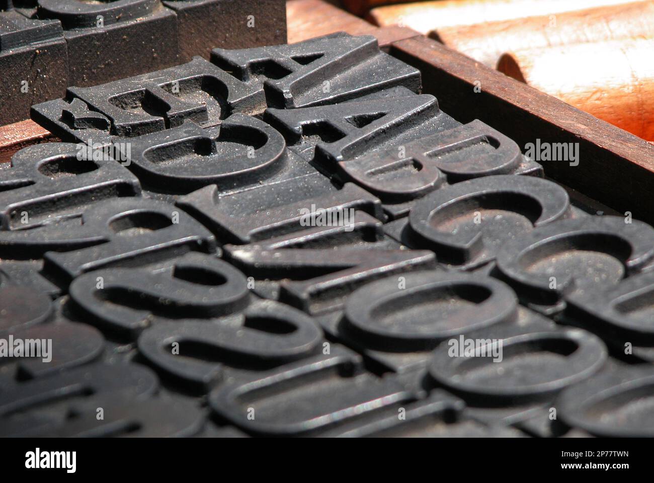 Metal typesetting, letters in type case for printing Stock Photo