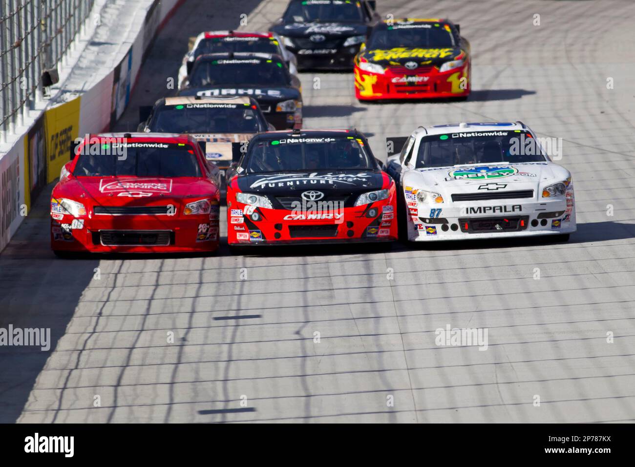 BRISTOL, TN MAR 19, 2011 Kyle Busch (18), Willie Allen (05) and Joe