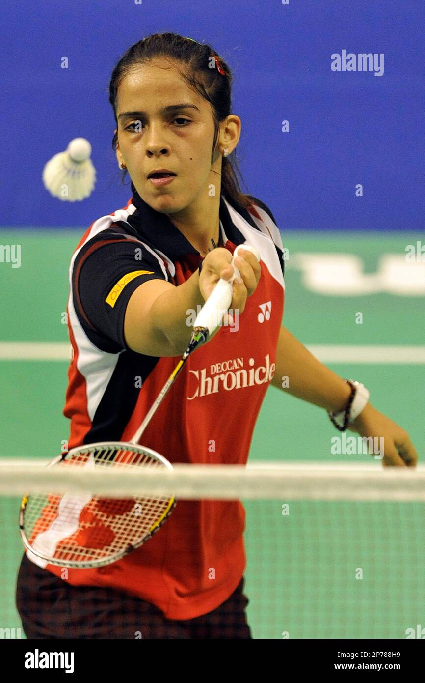 Indias Saina Nehwal returns a shuttlecock to Koreas Youn Joo Bae during their womens singles semifinal match at the Badminton Swiss Open tournament in the St
