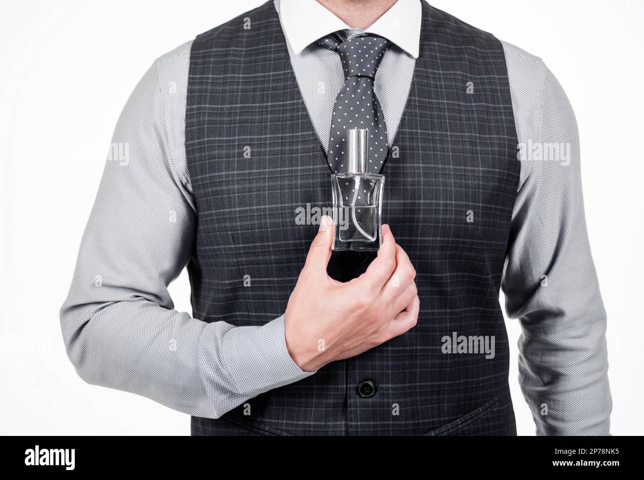 cropped man hold male perfume bottle, fragrance Stock Photo