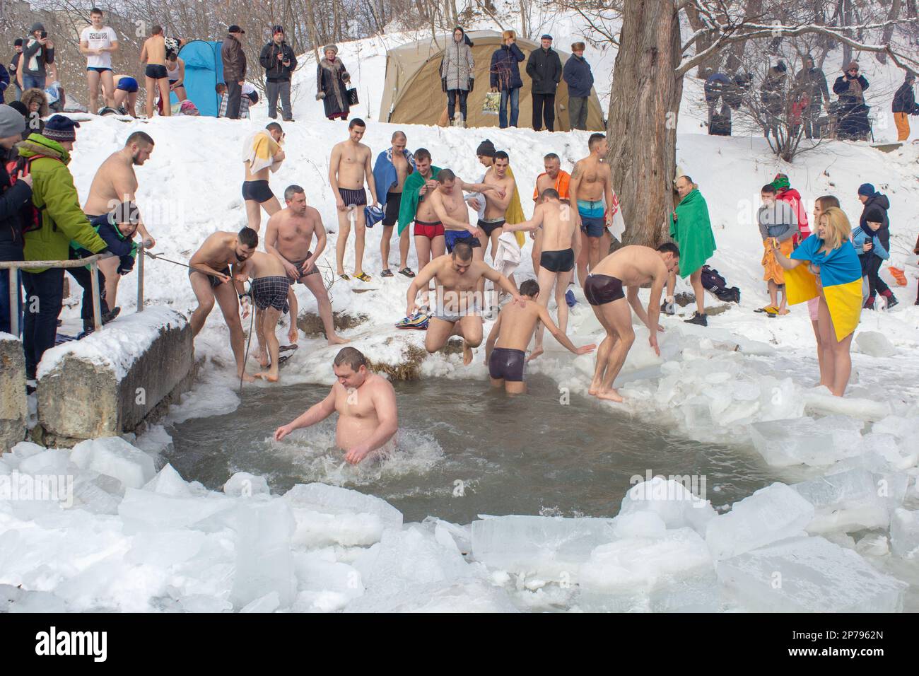 19.01.2017 Ukraine Lviv,many people bathe in winter and get baptized in cold water Stock Photo