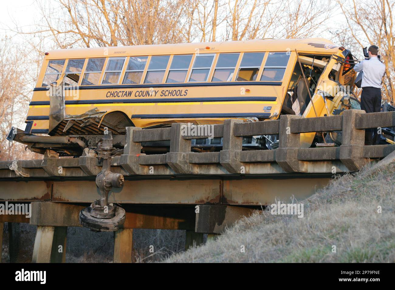 A Choctaw County school bus hangs off a Calhoun County bridge after it ...