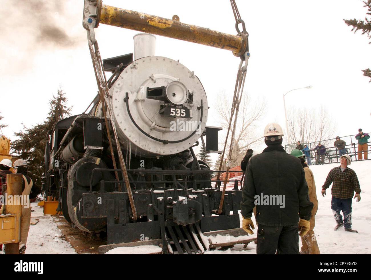 Wasatch Railroad Contractors and Black Hills Trucking workers lift and ...
