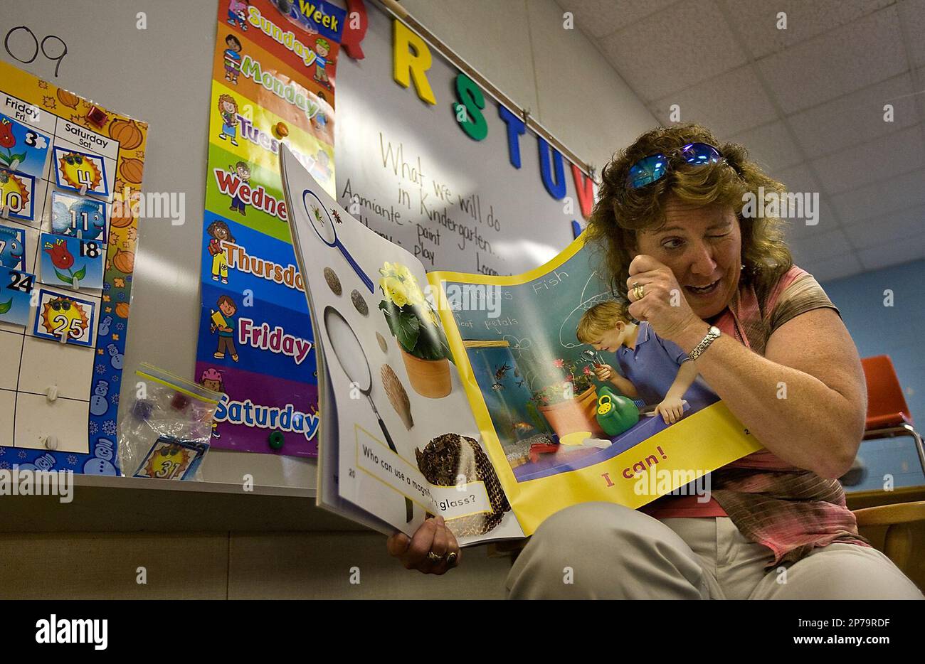 Suffolk Public School teacher, Karen Branson, shows what a magnifying