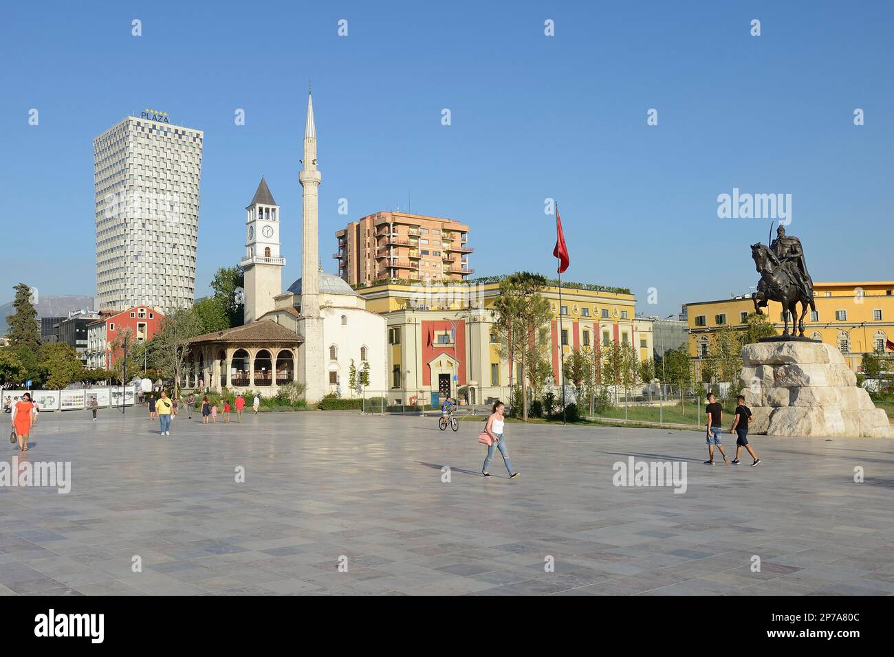 Plaza Hotel, Bell Tower, Ethem Bey Mosque and Skanderbeg Monument, Skanderbeg Square, Tirana, Albania Stock Photo