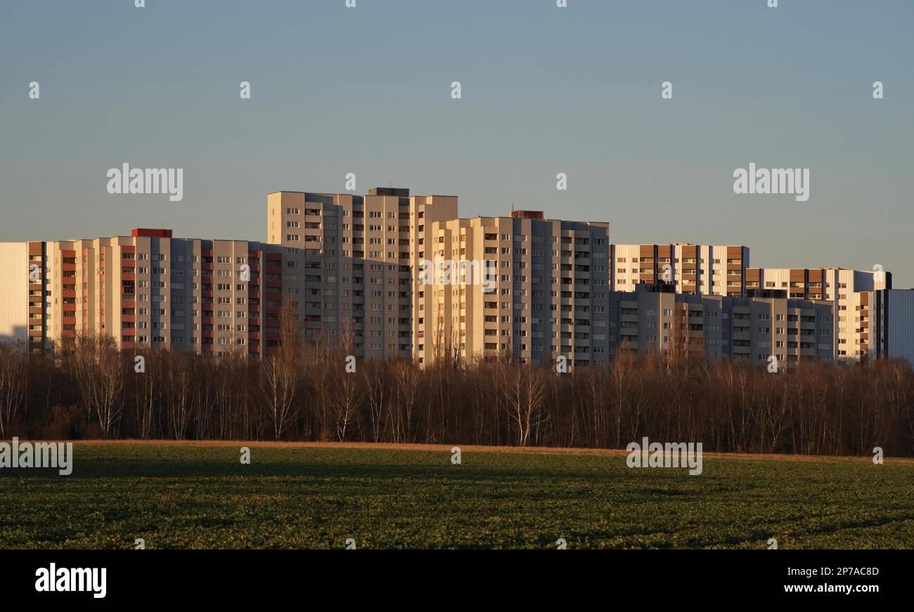 Tenement houses on the outskirts of the city in the evening light, Gropiusstadt, Neukoelln district, Berlin, Germany Stock Photo
