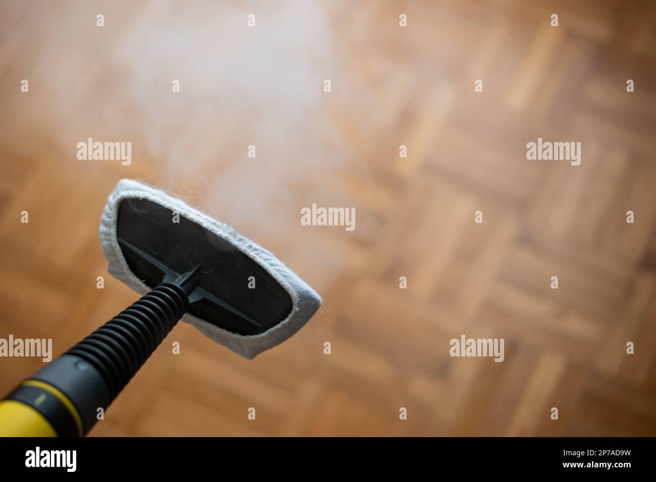 Steam pressure cleaner nozzle with cloth attachment. Cleaning and