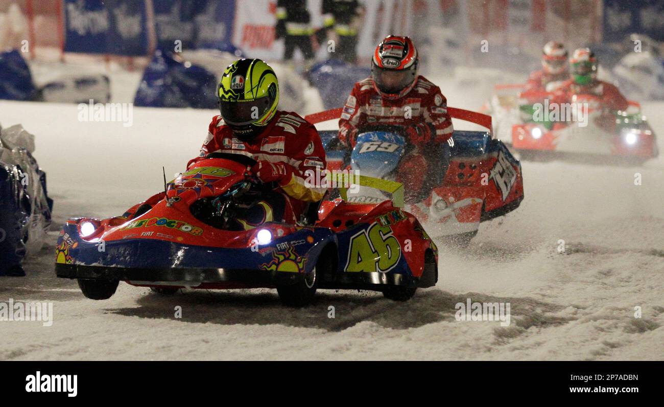 Ducati Moto GP rider Valentino Rossi of Italy, left, leads his teammate Nicky  Heiden of the United States during a race on an ice track in Madonna di  Campiglio, Italy, Friday, Jan.14,