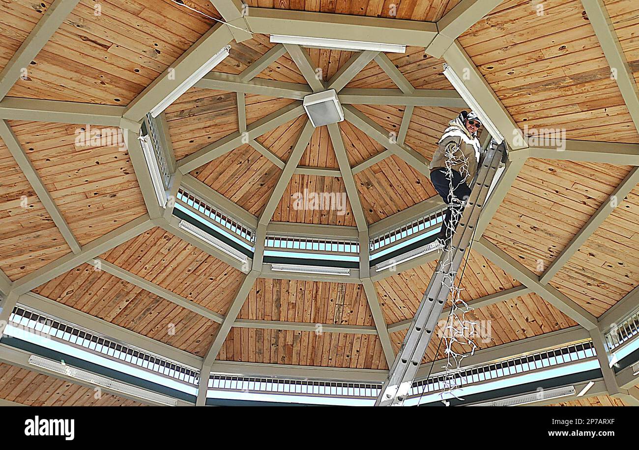 Randy Fowler, an employee with the city of Beckley, takes down