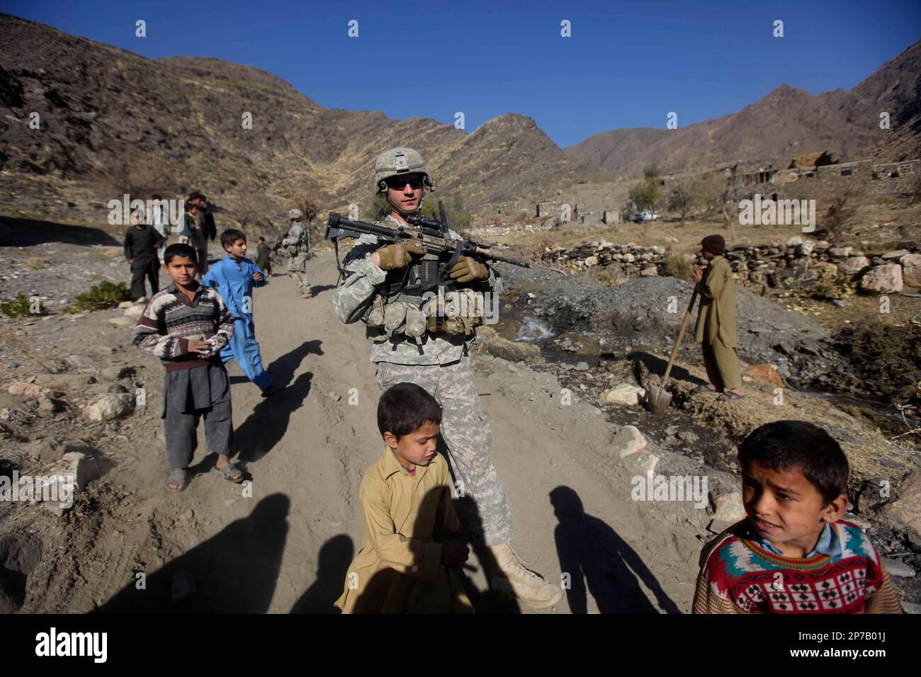 Sgt Rafiq Sgt. Spear Wesley from Saint Johns, MI., of 2nd Platoon Bravo Company 2 ...